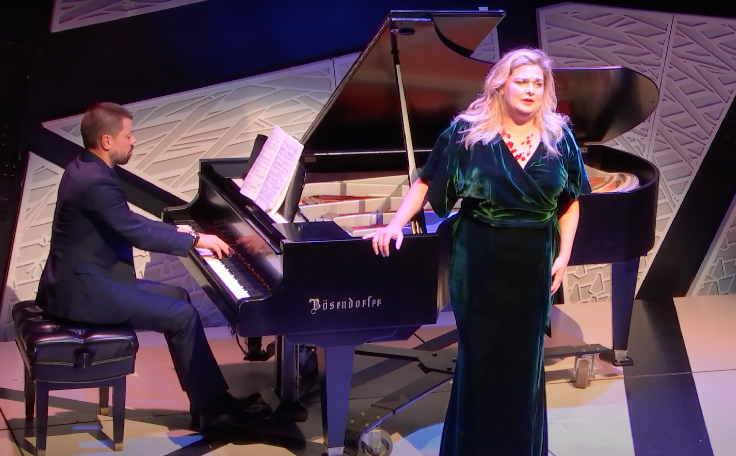 Eowyn Singing in front of an open grand piano at national sawdust
